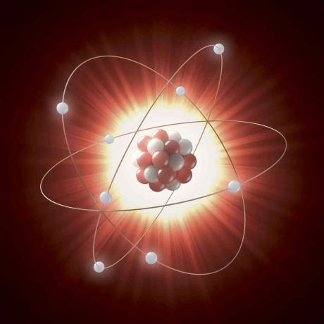 Илюстрация на атомно ядро ​​като поредица от червени и бели кръгове, орбитирани от електрони, представени от бели кръгове.